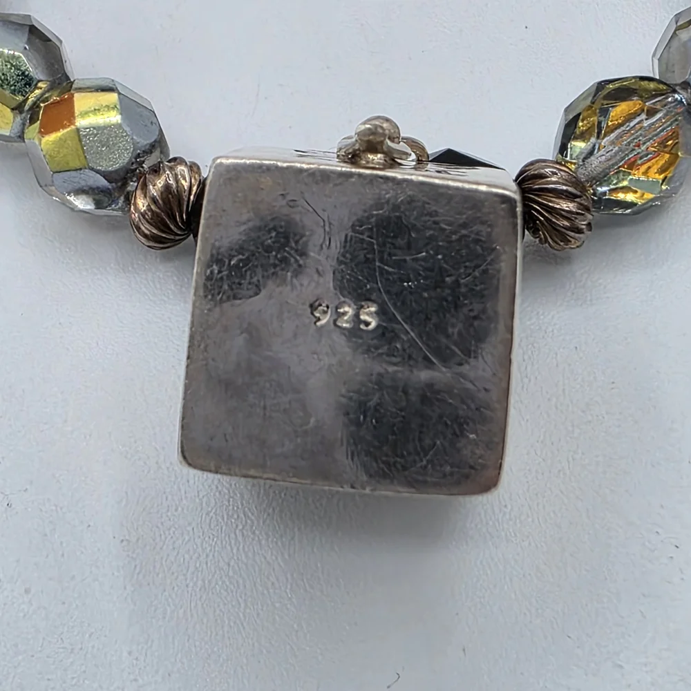 Elegant Black and Gold Charm Bracelet